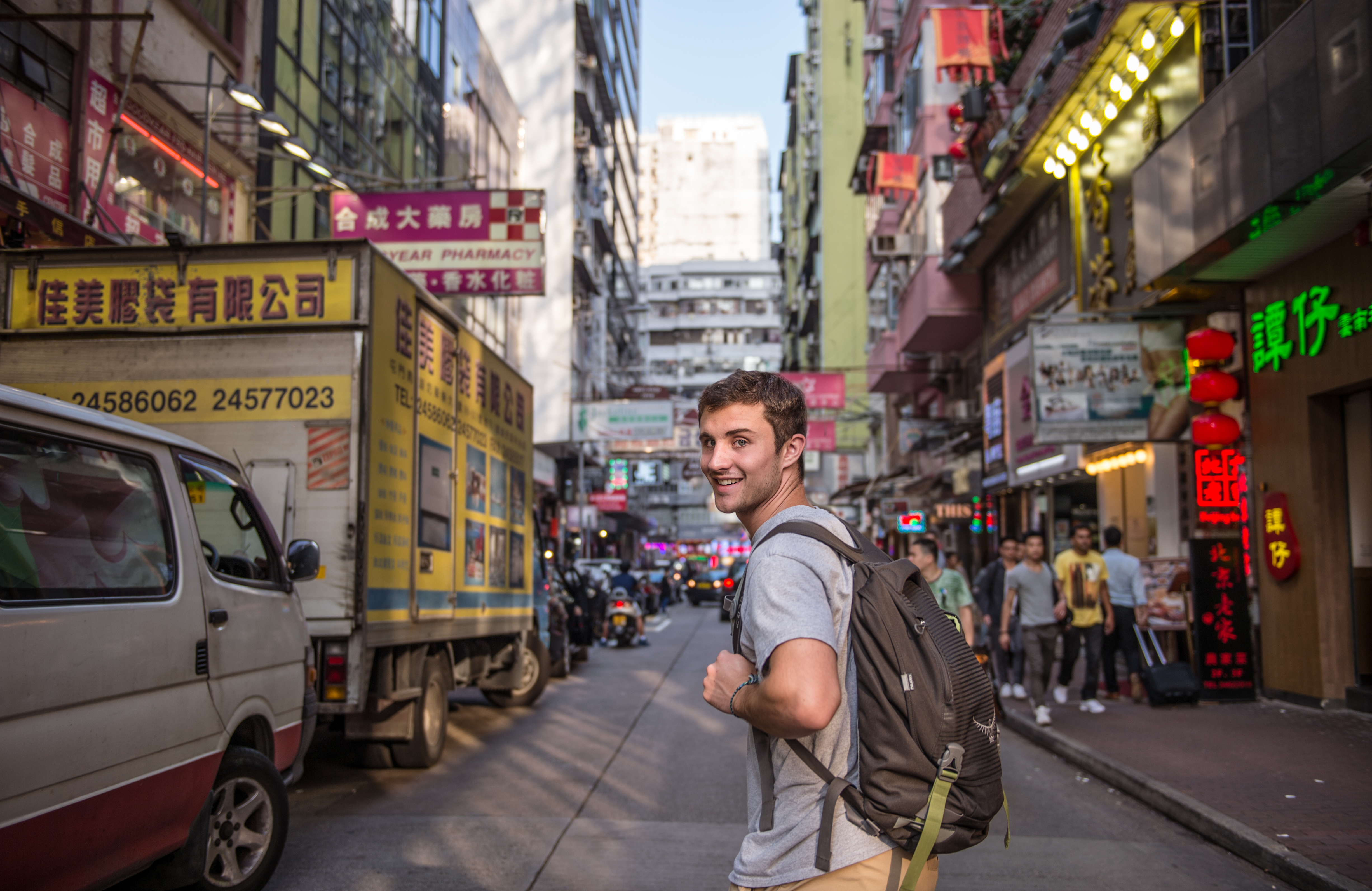 Cameron Halsted walks through the Ladies Market in Hong Kong.