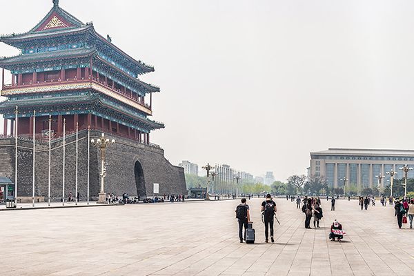 People walking in Tiananmen Square near the Gate of Heavenly Peace.